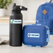 Custom name labels applied to water bottle and lunch box