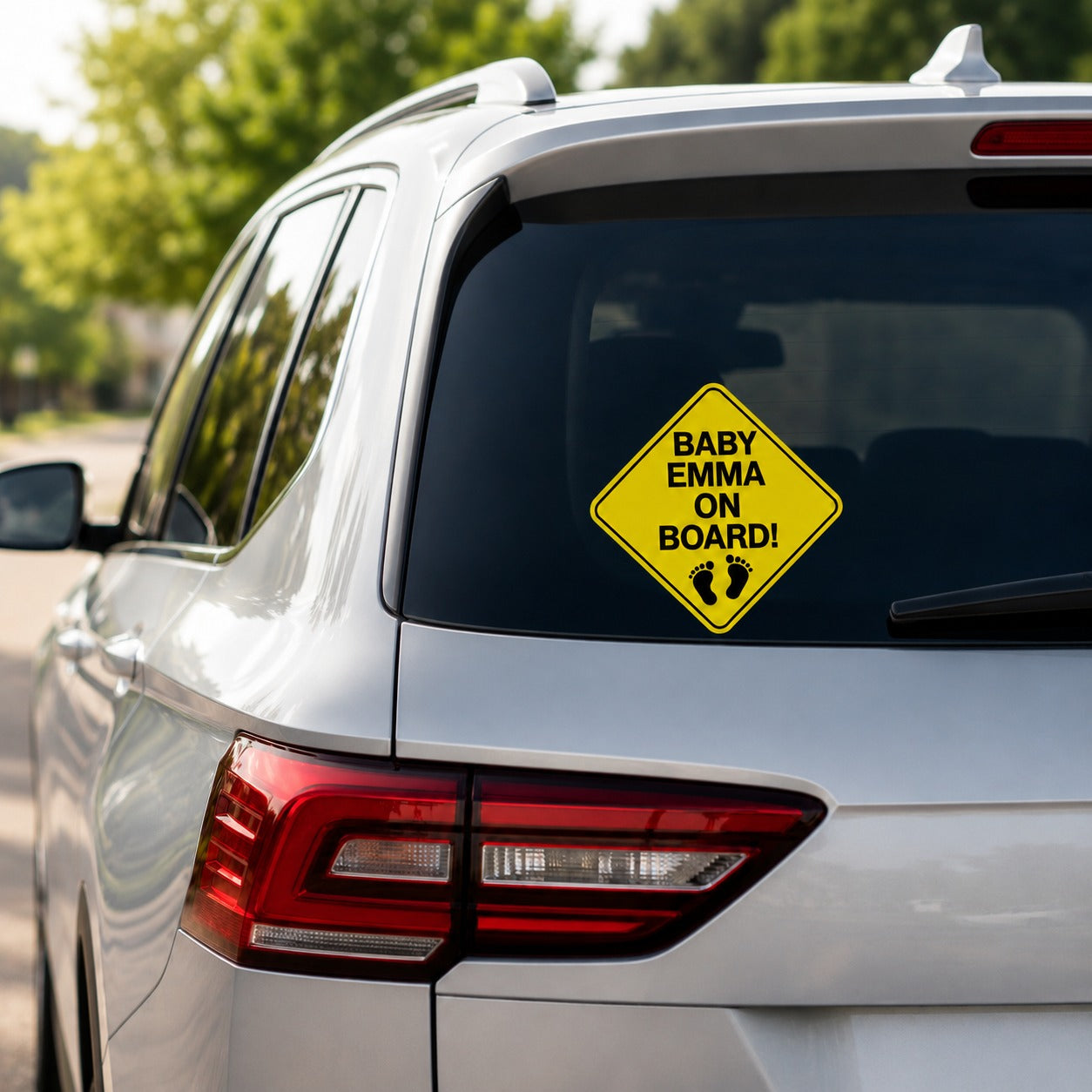 Custom Baby Emma On Board vinyl decal applied to the rear window of a silver SUV.