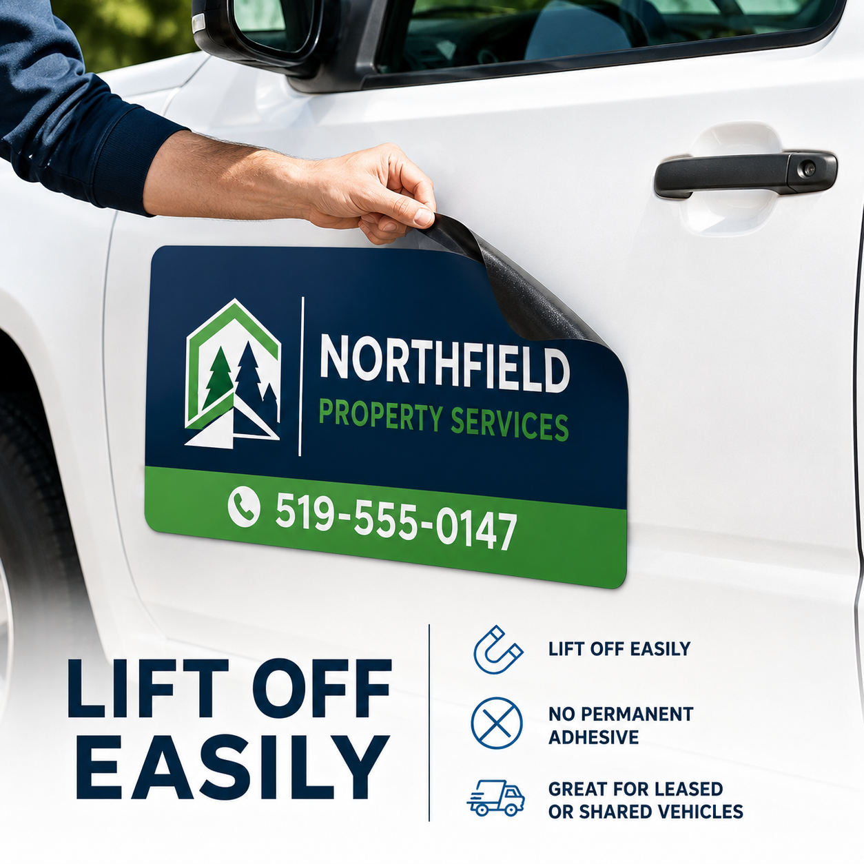 Hand lifting removable magnetic truck door sign from vehicle door