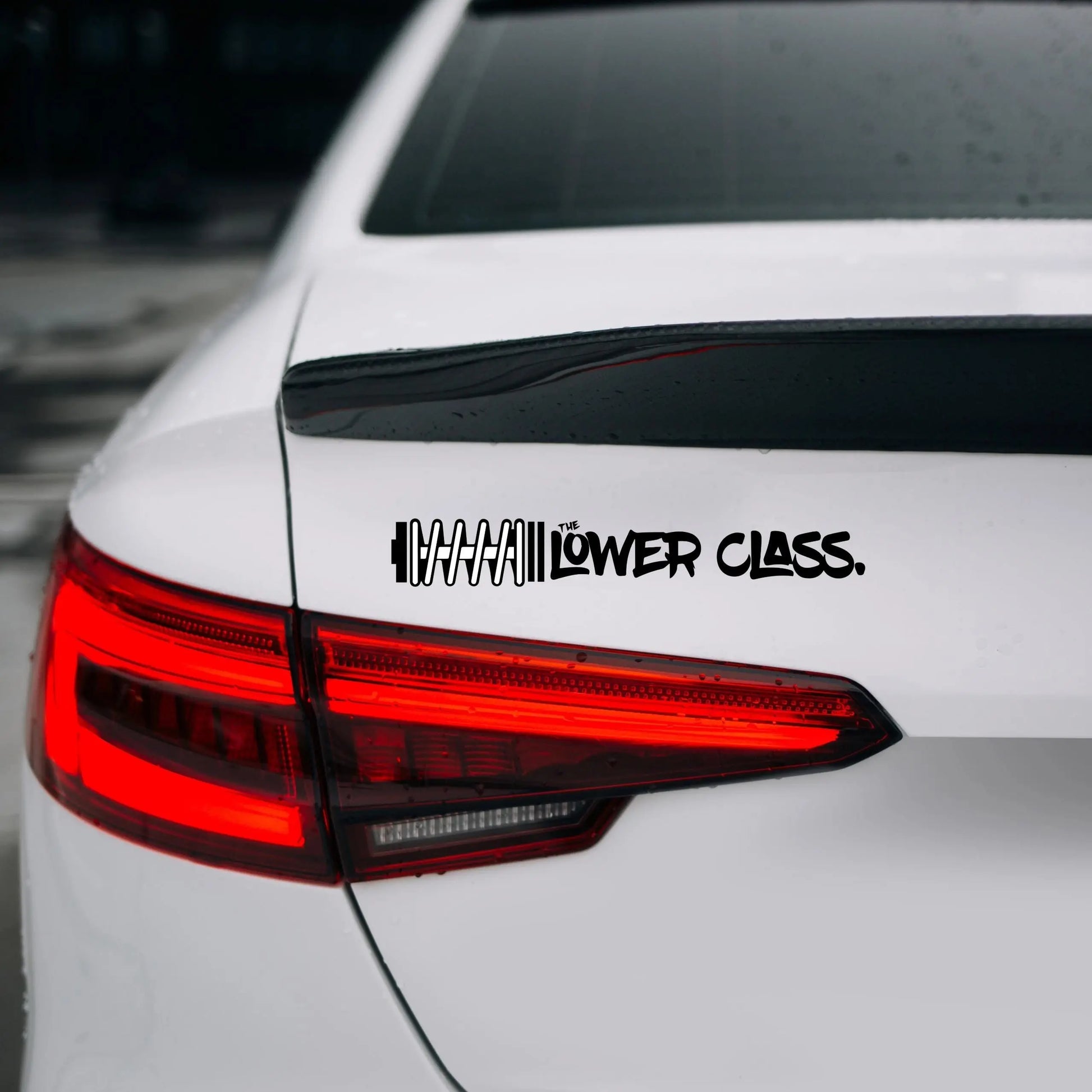 Weatherproof car sticker on window of vehicle
