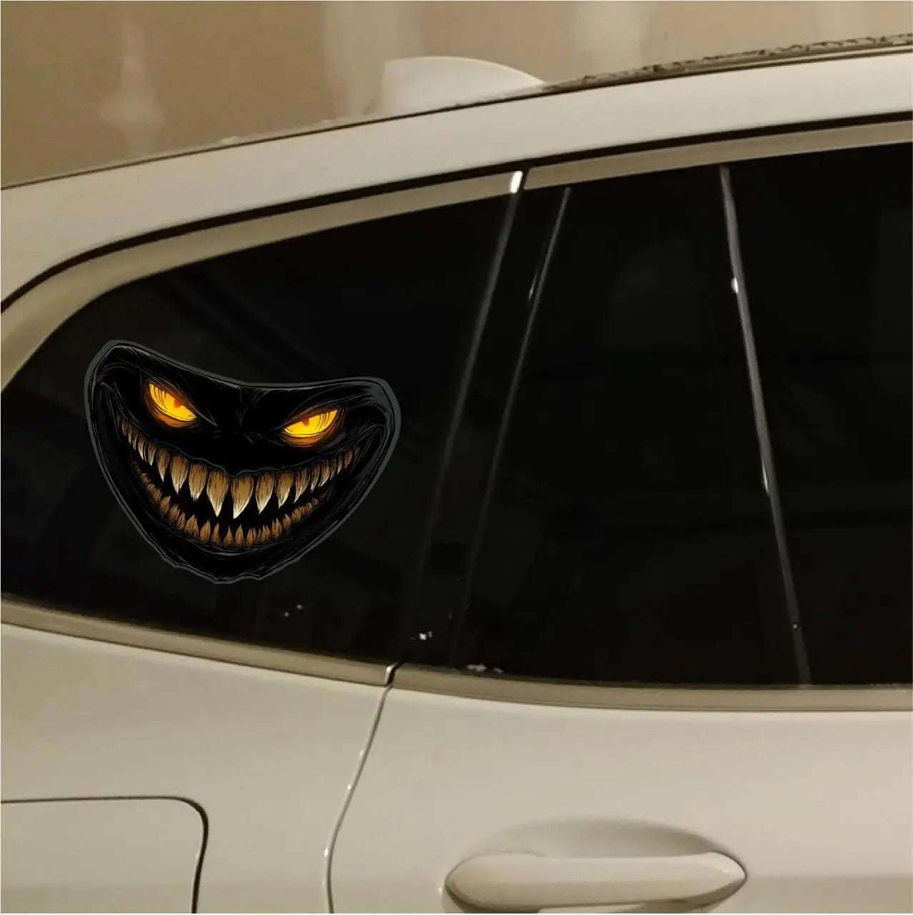 Here are a few options for alt text, keeping under 100 characters:

* **Scary monster face decal on car headlight.**
* **Car 