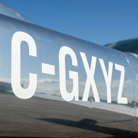 Canadian tail number decals on aircraft fuselage
