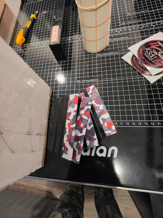 Custom die-cut vinyl decals — production sample