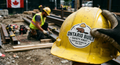 Close-up of custom hard hat stickers in Canada showing durable material and safety markings