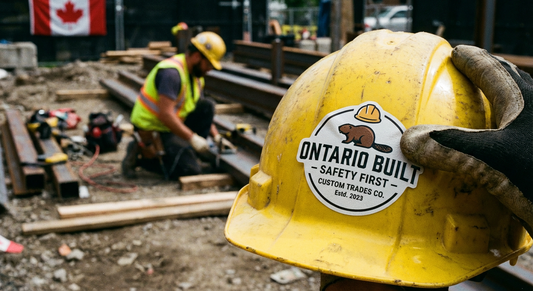 Close-up of custom hard hat stickers in Canada showing durable material and safety markings
