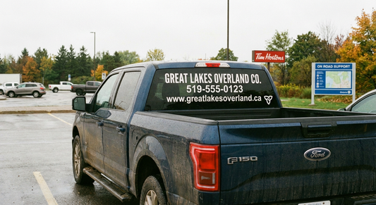 Custom rear window text decal for trucks in Ontario — bold vinyl lettering on glass