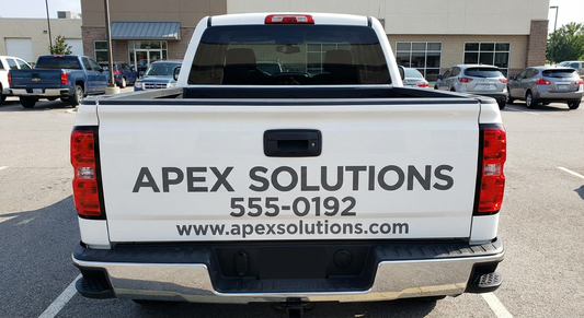 Custom tailgate text decal for trucks in Canada — personalized lettering on metal