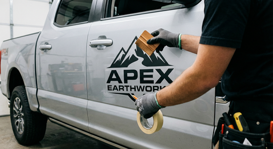 Close-up of custom door logo decals in Canada showing precise cut edges and vibrant colours