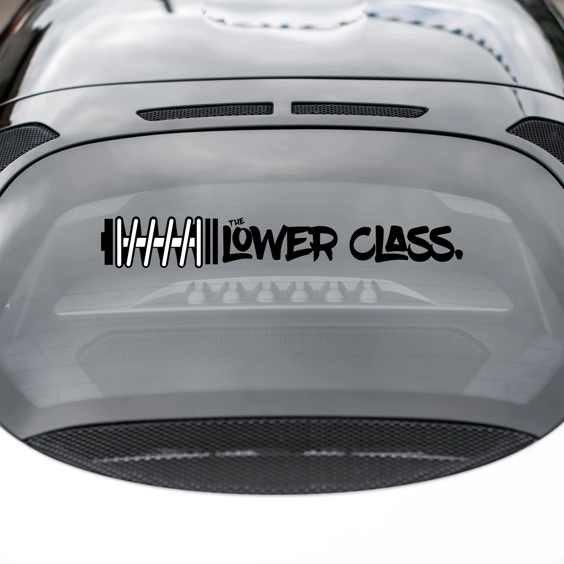 Premium JDM Stance Vinyl Decal on car window. Weatherproof and removable, with clear and bold design.