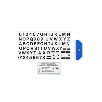 Snowmobile registration decal kit flat lay with vinyl sheet, squeegee, and instructions