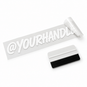 Custom social handle decal applied to a pickup truck window
